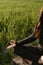 Woman in lotus position practicing yoga in Bali, gyan mudra