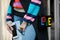 Woman with Love bag with Lego bricks and striped colorful shirt before Antonio Marras fashion show, Milan