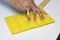 A woman lubricates with a silicone baking dish. Using this brush.