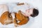 Woman lying in bathtub filled with charcoal bath bomb, selective focus