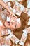 woman lying down with many cash money five thousand russian rubles notes