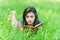 Woman lying down reading book