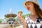 Woman with macaron in Provence