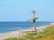 Woman made from driftwood on sea coast, Lithuania