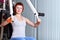 Woman make exercise on training apparatus