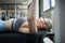 Woman makes bench press as strength training