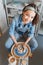 Woman making ceramic dishware on pottery wheel with clay, workshop and leisure concept