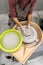 Woman making ceramic work with potters wheel. Making a handmade clay pot in the workshop