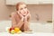 Woman making choice between fruit and donut