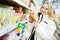 Woman making dairy shopping