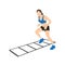 Woman making drill training on agility ladder.