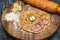 Woman making Indian flatbread Aloo Paratha Rajasthan