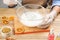 Woman making natural handmade soap at table, closeup