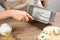 Woman making natural handmade soap at table, closeup