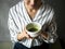 Woman making oriental green tea Japanese ceremony