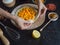 Woman making pumpkin pie with goji berries. Superfoods cuisine.