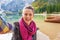 Woman making selfie on lake braies in south tyrol