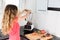 Woman making smoothie in the kitchen