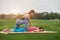 Woman making thai massage to mature woman.