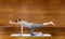 Woman making yoga in balancing table pose on mat