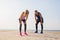 Woman and man feeling tired and exhausted after workout outdoors