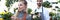 Woman and Man Holding Domestic Flower in Pots