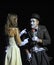 Woman and man mime performing on stage