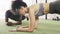 Woman, man and plank exercise for fitness workout routine in gym for wellness, muscle growth or physical activity