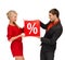 Woman and man with red percent sale sign