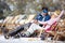 Woman and man resting in sun lounger