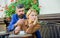 Woman and man with serious faces have coffee at cafe. Relations problems concept. Girl and bearded guy have coffee cafe