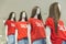 Woman mannequins with t-shirts with the inscription Sale
