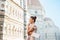 Woman with map and audio guide in florence, italy