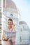 Woman with map and audio guide in florence, italy