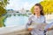 Woman with map on bridge ponte umberto I in rome