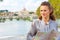 Woman with map on bridge ponte umberto I in Rome