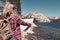 Woman with map at a lake in Yosemite Park. wanderlust concept