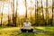 Woman with mask meditating in nature alone.Social distancing and active healthy lifestyle. Mindfulness meditation practice.