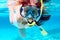 Woman with mask snorkeling