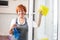 Woman mature cleaning window