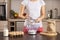 Woman measuring flour