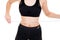 Woman measuring her waist over white background in sporty wellness concept