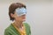 Woman With Medical, Surgical Mask Cover On Her Face
