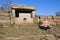 A woman meditates near the dolmen on the Nexis ridge. Russia, the neighborhood of Gelendzhik