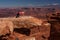 Woman meditating doing yoga in Canyonlands National park in Utah