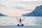 Woman meditating at the lake