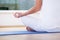 Woman meditating in lotus position