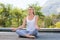 Woman meditating outdoors