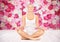 Woman meditating in yoga lotus pose