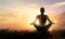 Woman meditating yoga at sunset mountains with nature. Outdoor s